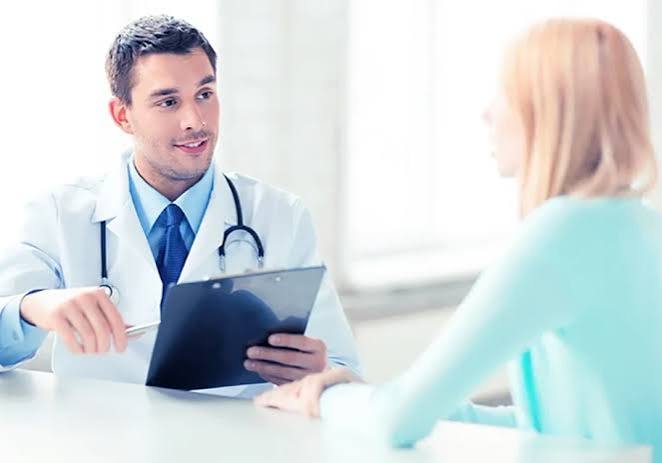 Doctor consulting international patient in India